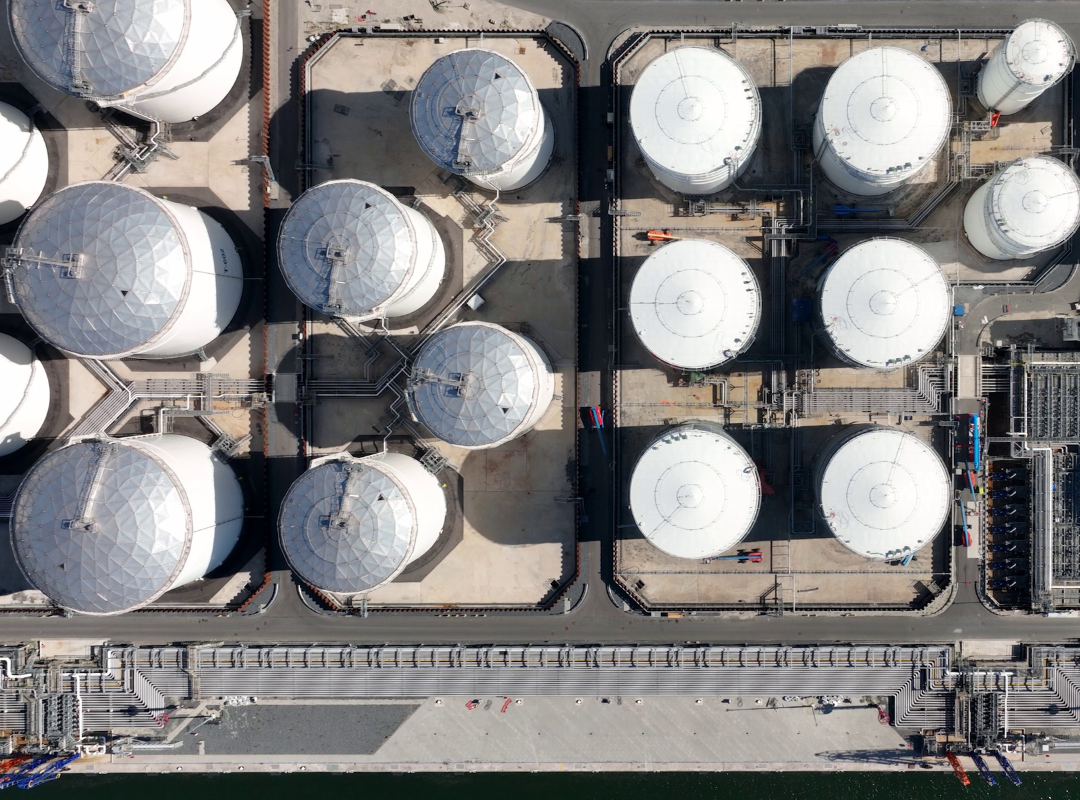 Overhead view of storage tanks and connecting pipework at Dammam