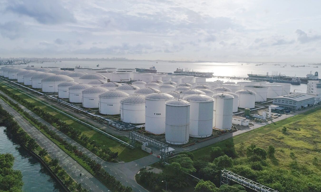 Aerial view of Jurong storage tanks and vessels along the waterfront