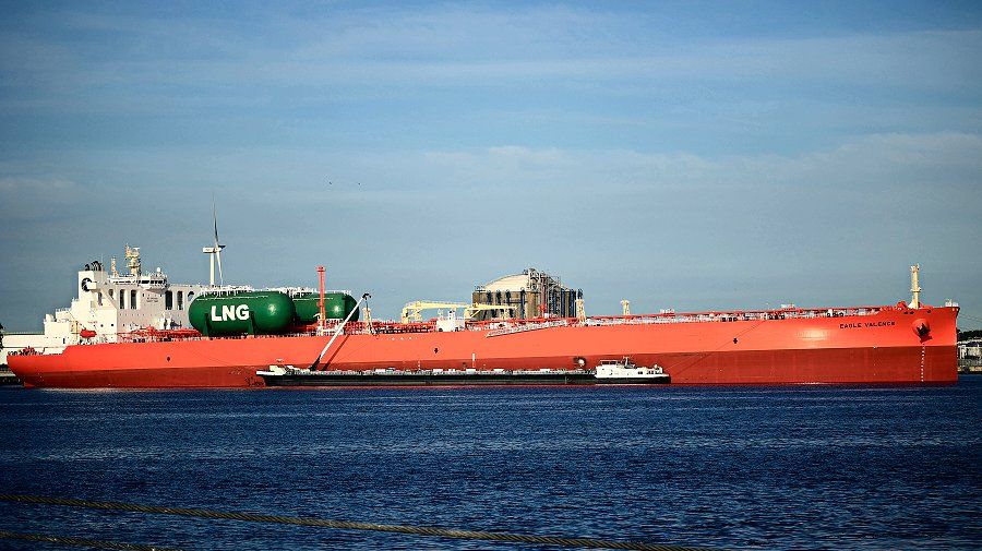 Eagle Valence at berth, broadside view with a bunker barge alongside