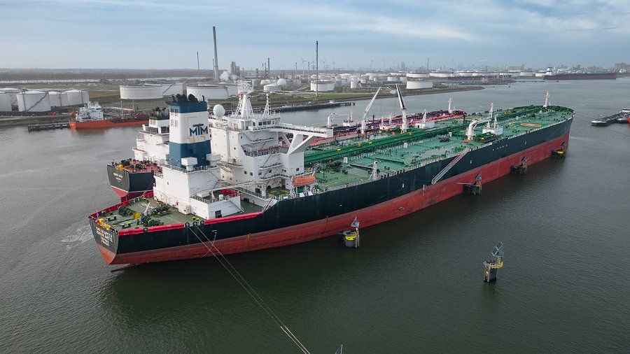 Maran Arete viewed over the bow, green deck piping visible